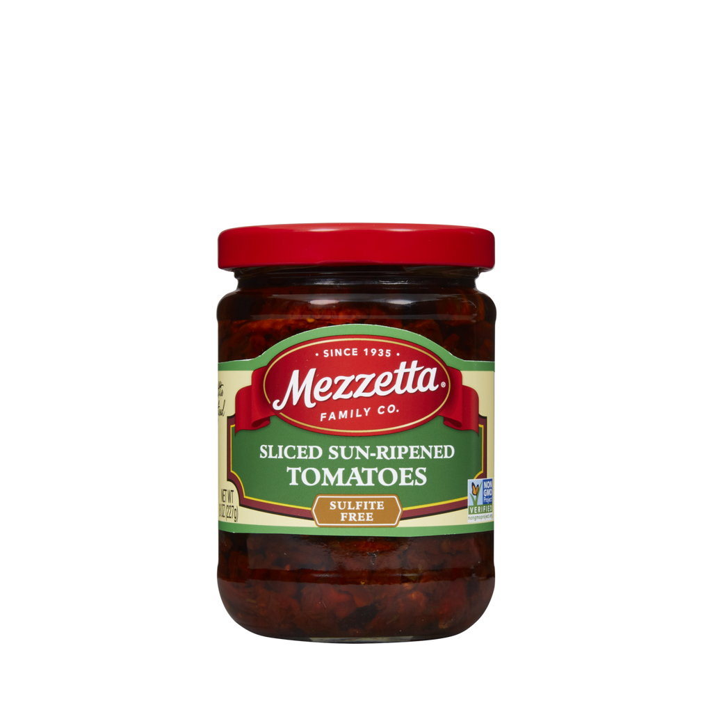 A glass jar displays sliced sun-ripened tomatoes from Mezzetta Family Co., promising a burst of flavor.
