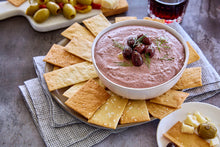 Load image into Gallery viewer, A bowl of Kalamata and White Bean Dip served with crackers