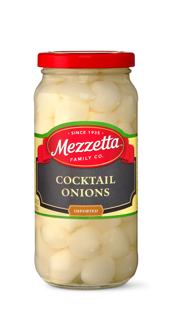 A clear glass jar displays Mezzetta brand cocktail onions, perfect for adding a zesty bite to martinis and other recipes.