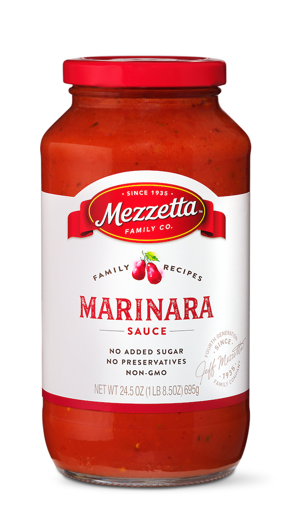 A jar of Mezzeta Family Company Marinara Sauce sits against a black background, showcasing its vibrant red color and classic labeling.