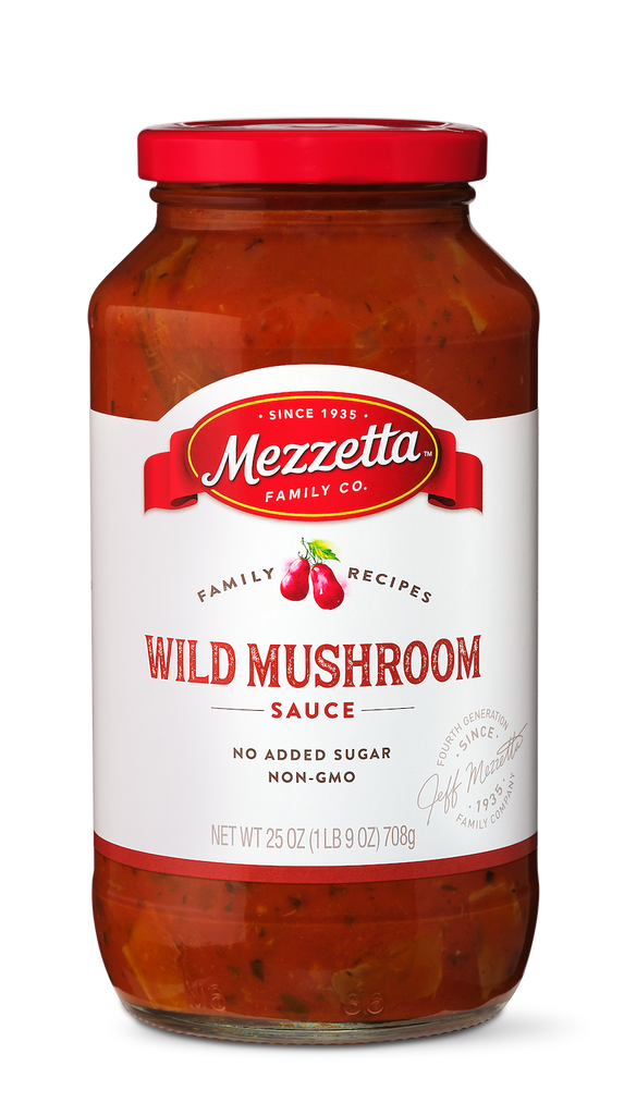 A jar of Mezzeta Family Company Wild Mushroom Sauce displays its savory contents against a white background.