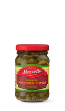 Load image into Gallery viewer, Glass jar filled with Mezzetta brand non-pareil capers.