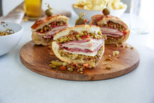Load image into Gallery viewer, Three slices of a Muffuletta sandwich