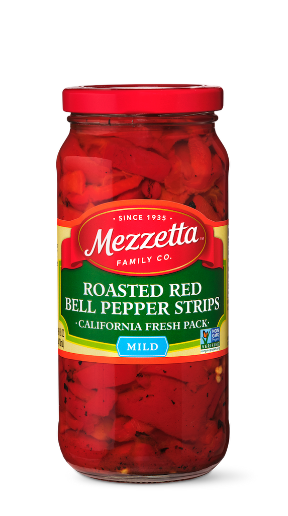 Glass jar filled with Mezzetta Roasted Red Bell Pepper Strips.