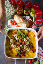 Load image into Gallery viewer, A casserole dish of Mezzetta products and cheese next to bread and Mezzetta jars