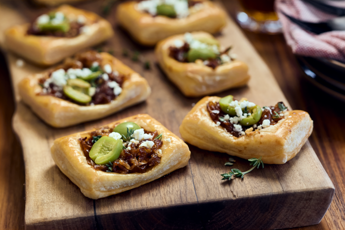 Mini Puff Pastry Tarts with Caramelized Onions, Castelvetrano Olives and Goat Cheese