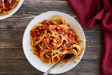 Load image into Gallery viewer, A plate of bucatini amatriciana
