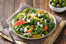 Load image into Gallery viewer, A plate of Kale and Citrus salad
