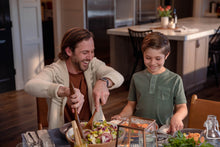 Load image into Gallery viewer, Father and son enjoying a meal at their kitchen table
