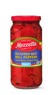 A glass jar displays Mezzetta Roasted Red Bell Peppers, packed fresh in California. The peppers have a mild flavor. 
