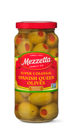 A glass jar displays pimento-stuffed, super colossal Spanish Queen olives from Mezzetta Family Co. 
